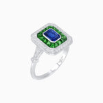 Load image into Gallery viewer, Art Deco Inspired Emerald Cut Halo Ring with Calibré Gems