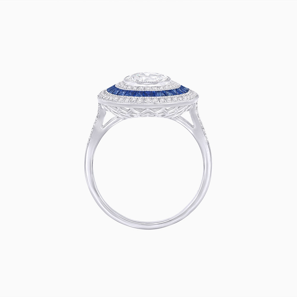 Oval Blue Sapphire Triple Halo Ring