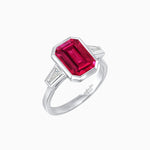 Load image into Gallery viewer, Modern Art Deco Inspired Emerald-Cut Bezel Engagement Ring with Tapered Baguette Side Stones - Shahin Jewelry