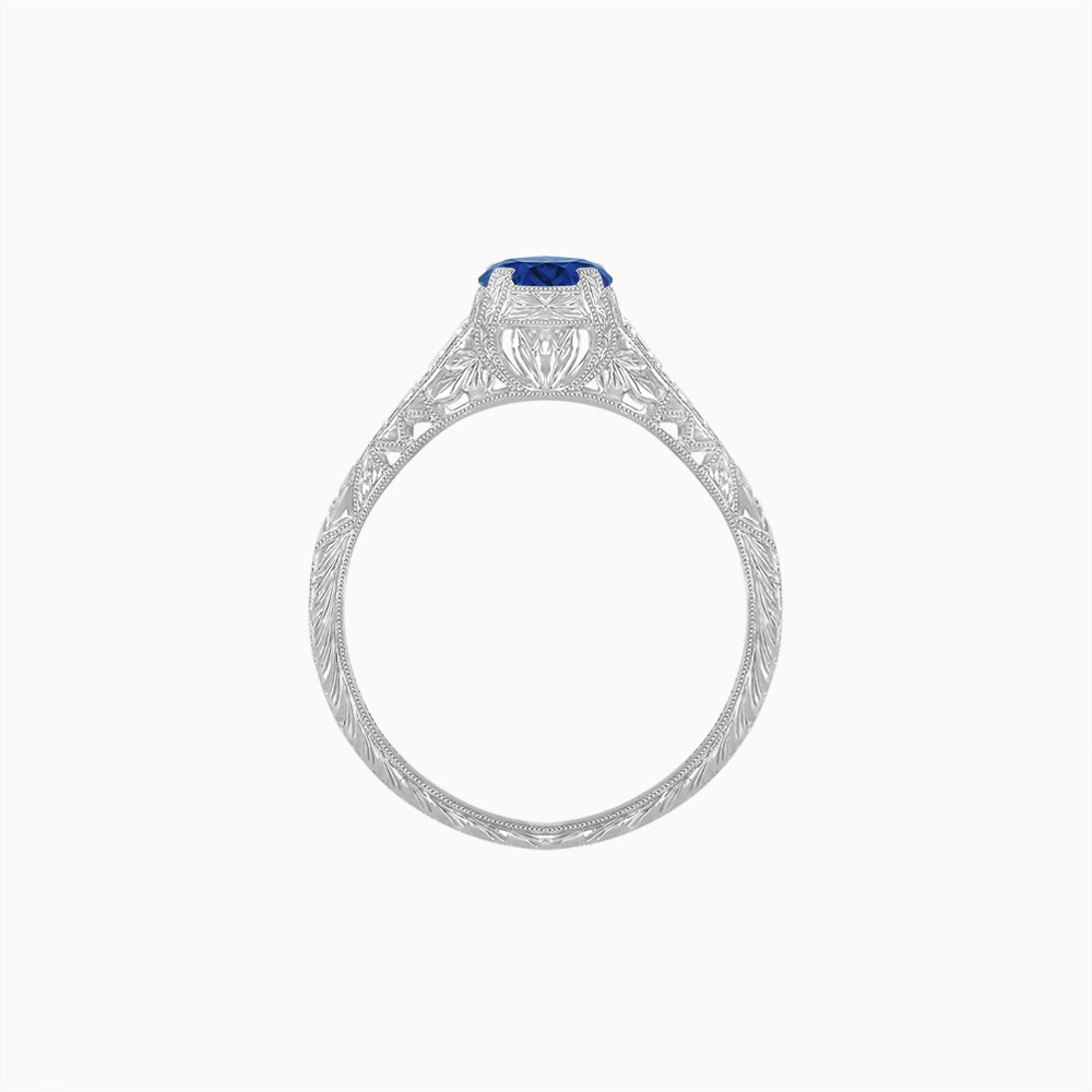 Vintage-Inspired Round Cut Ring with Tapered Diamond Accents and Hand-Engraved Details