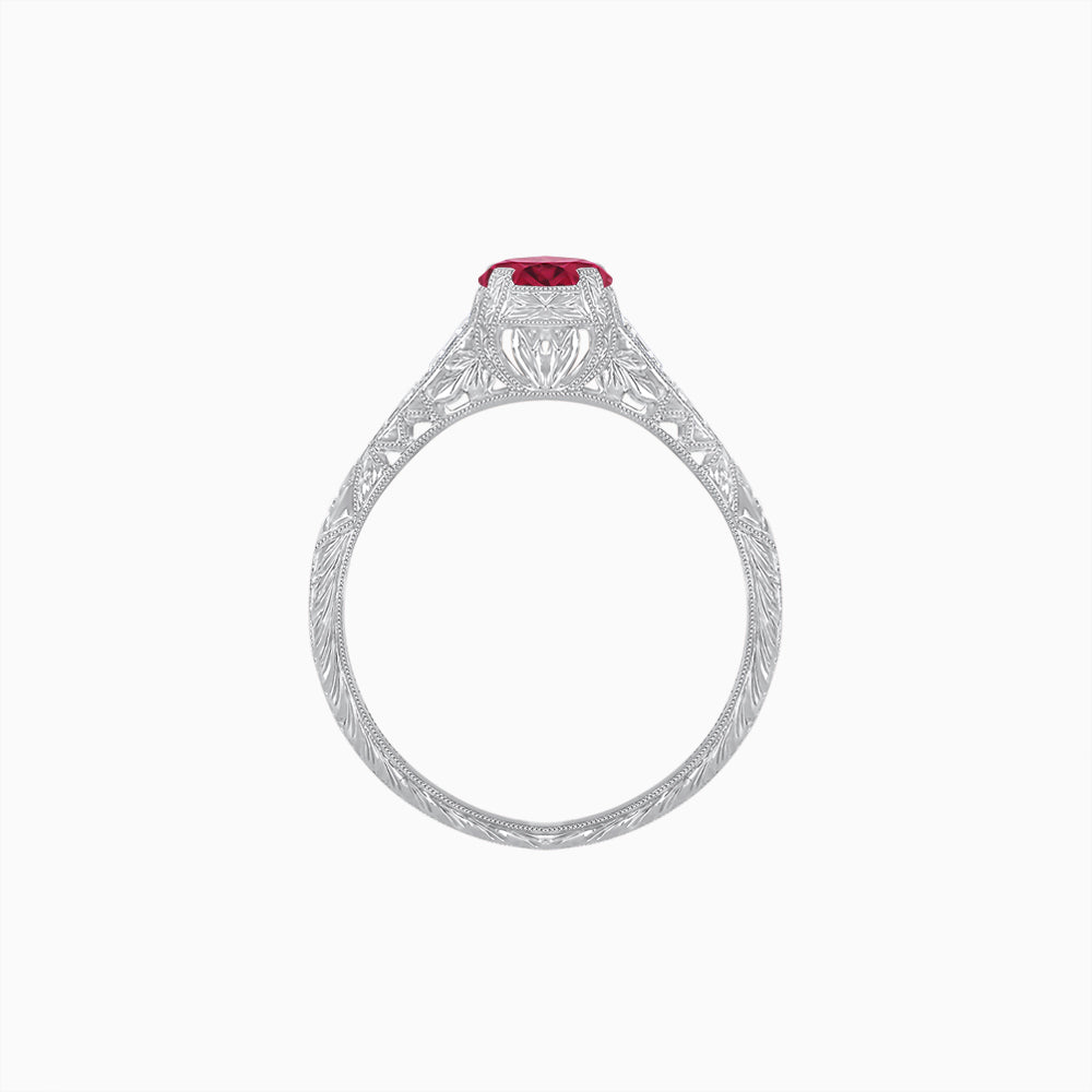 Vintage-Inspired Round Cut Ring with Tapered Diamond Accents and Hand-Engraved Details