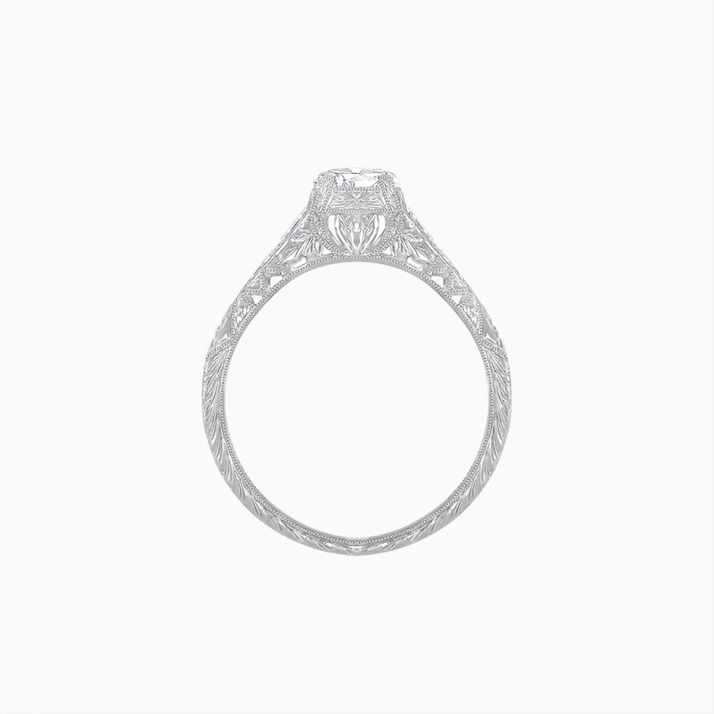 Vintage-Inspired Round Cut Ring with Tapered Diamond Accents and Hand-Engraved Details