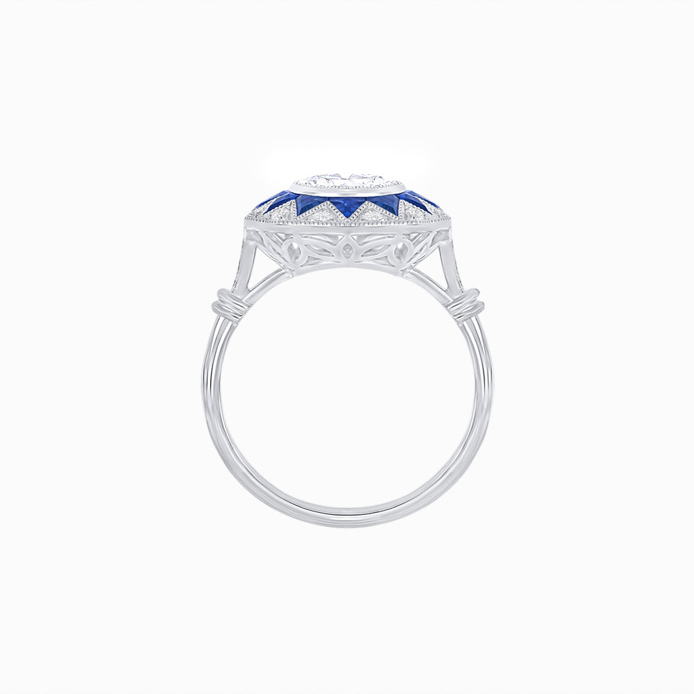 Art Deco Inspired Oval Starburst Calibré-Cut Halo Ring