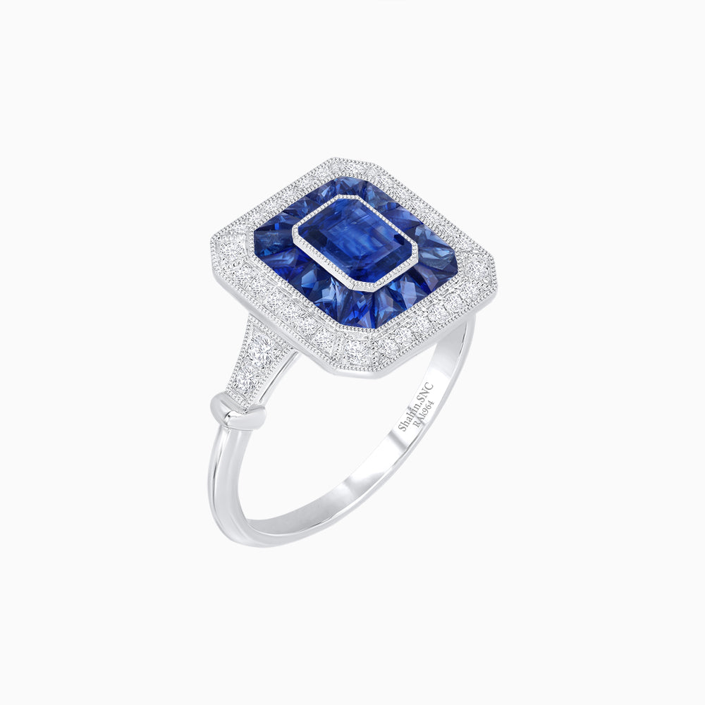 Art Deco Inspired Emerald Cut Halo Ring with Calibré Gems