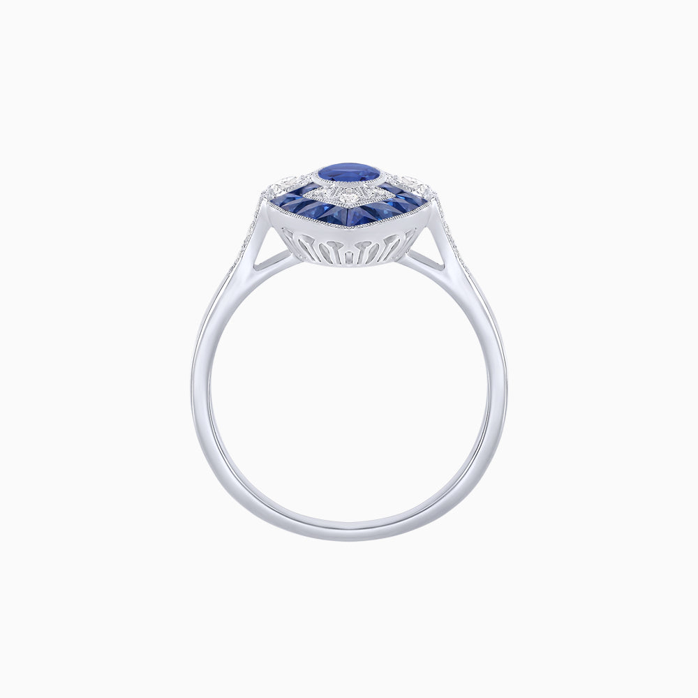 Art Deco Inspired Oval Cut Center Ring with Calibré-Cut Gemstone Navette Halo
