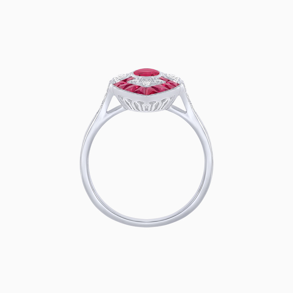 Art Deco Inspired Oval Cut Center Ring with Calibré-Cut Gemstone Navette Halo
