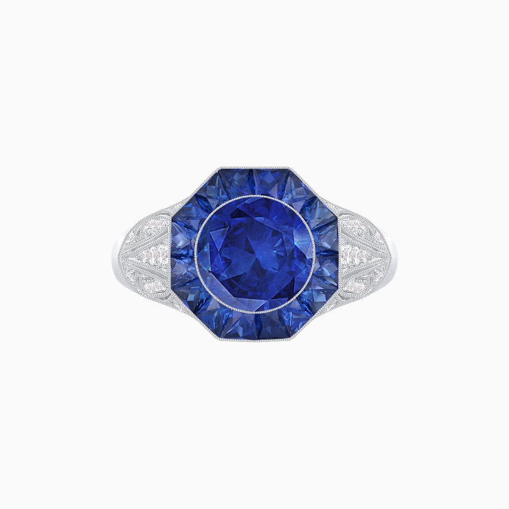 Art Deco Inspired Round Cut Ring with Octagonal Calibré-Cut Gemstone Halo