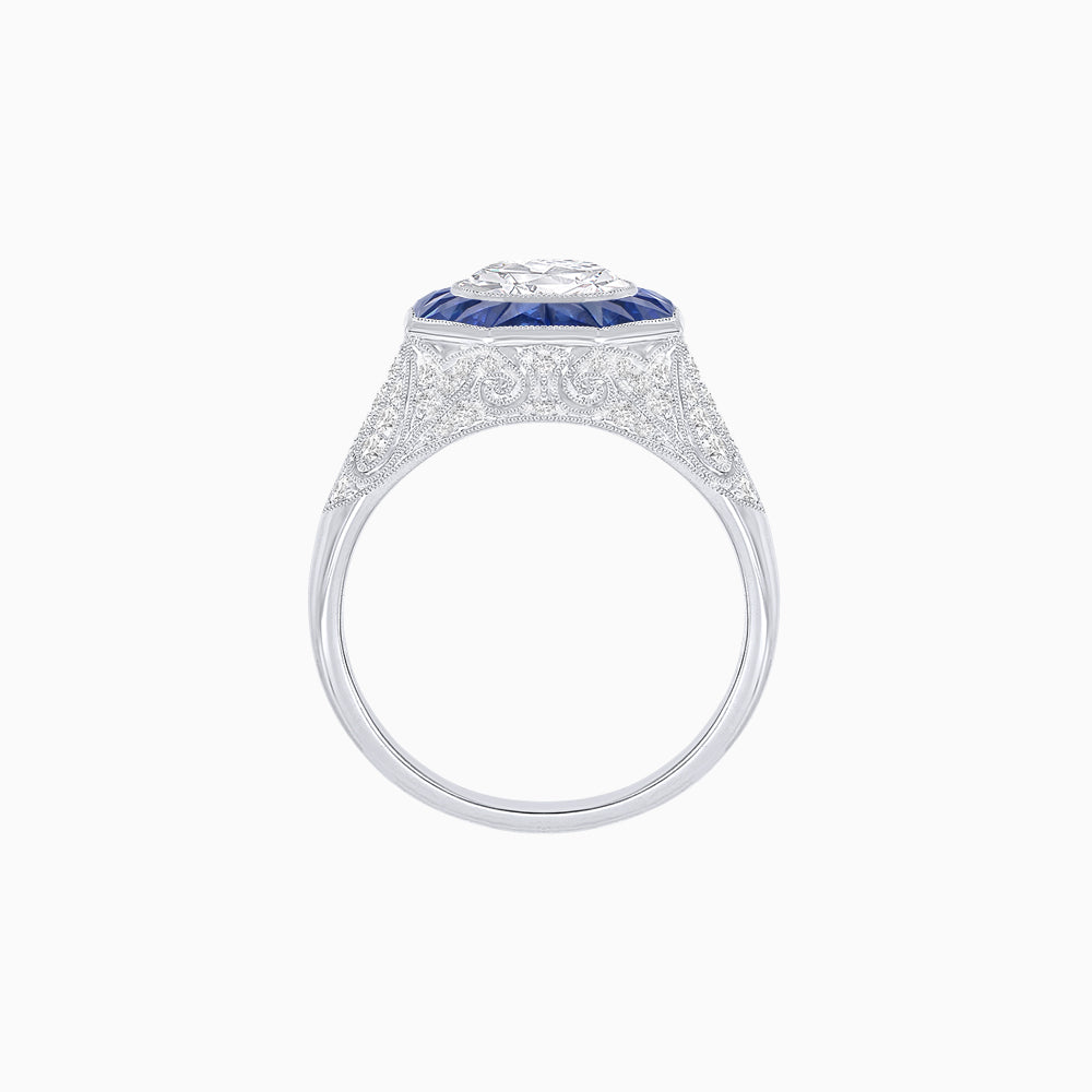 Art Deco Inspired Round Cut Ring with Octagonal Calibré-Cut Gemstone Halo