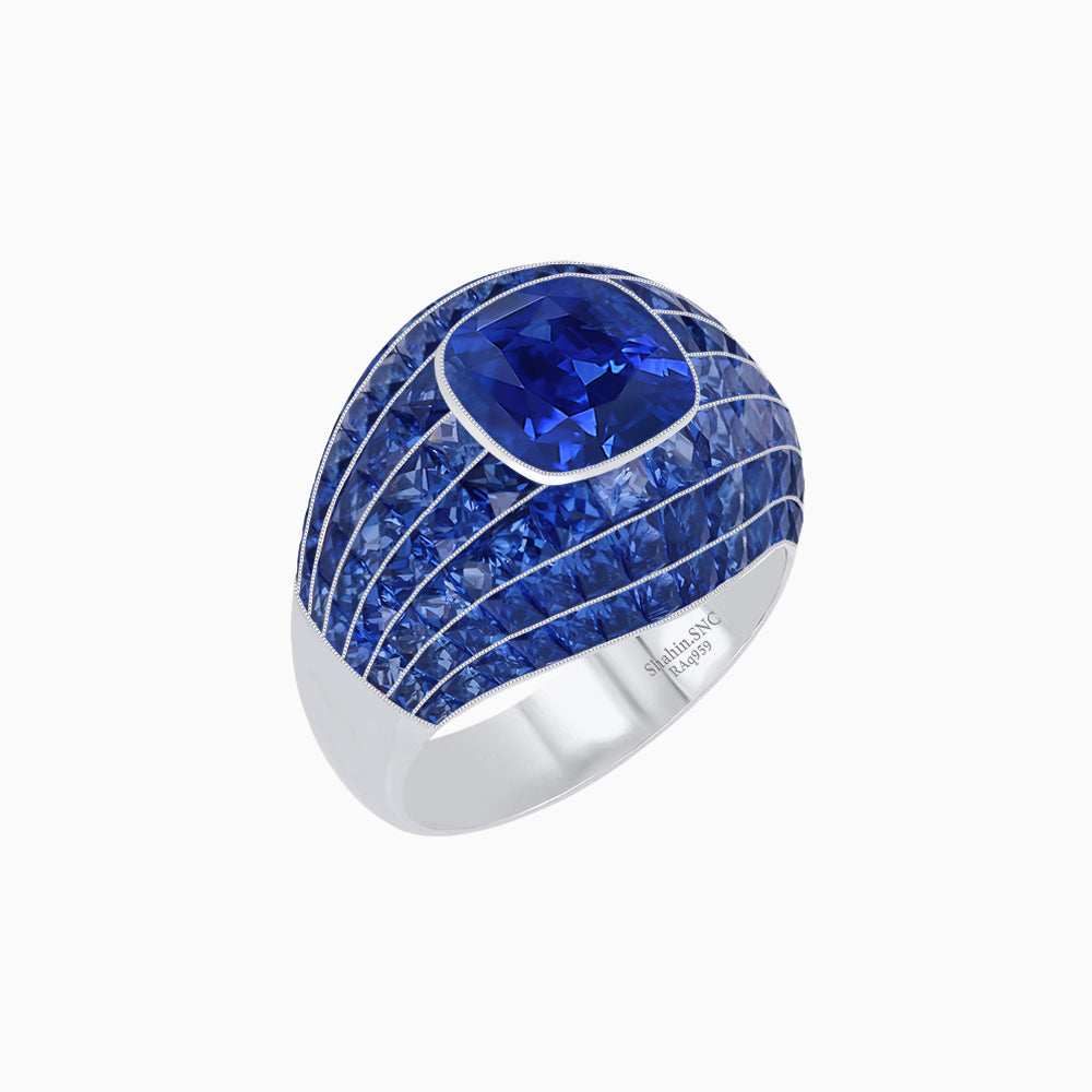 Art Deco Inspired Cushion Cut Center and Invisible-Set Calibré-Cut Dome Ring