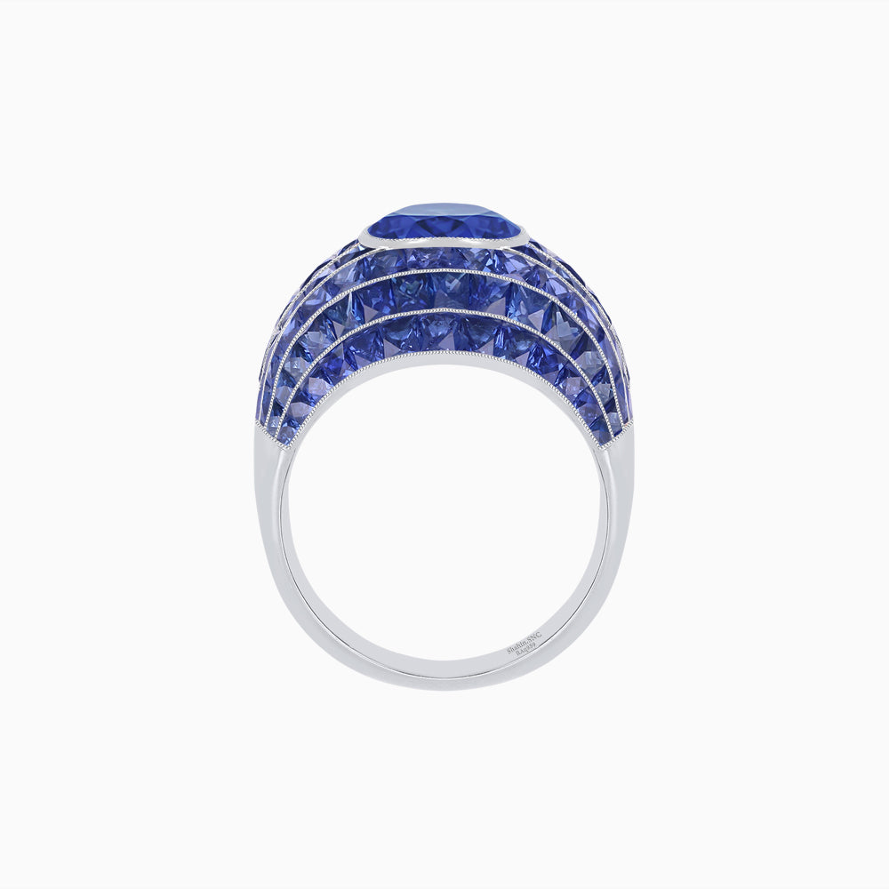 Art Deco Inspired Cushion Cut Center and Invisible-Set Calibré-Cut Dome Ring