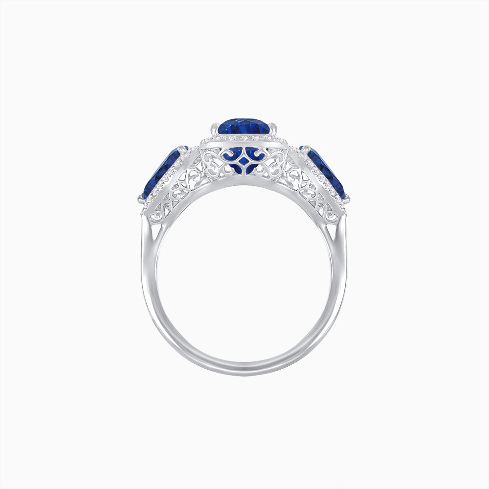 Vintage Inspired Cushion Cut Three-Stone Halo Ring with Pear-Shaped Side Stones