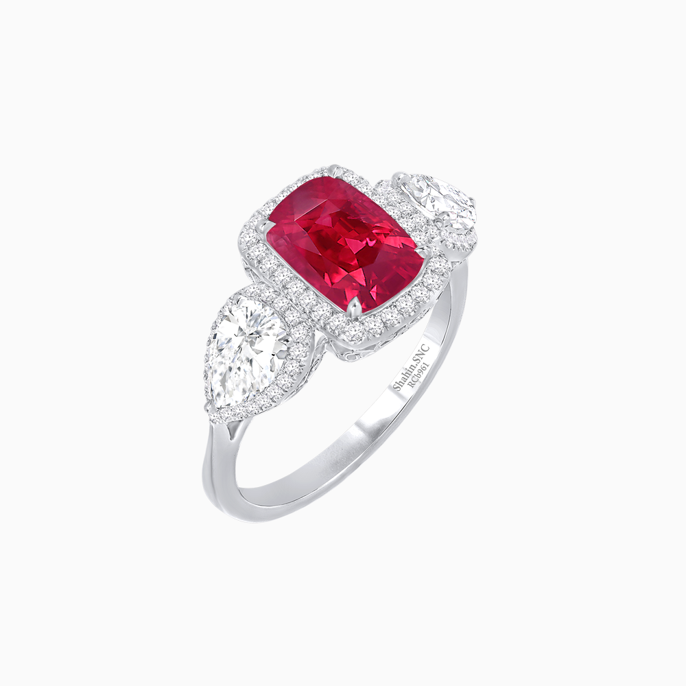 Vintage Inspired Cushion Cut Three-Stone Halo Ring with Pear-Shaped Side Stones