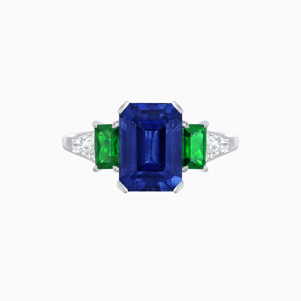 Art Deco Inspired Emerald Cut Three-Stone Ring with Tapered Baguettes