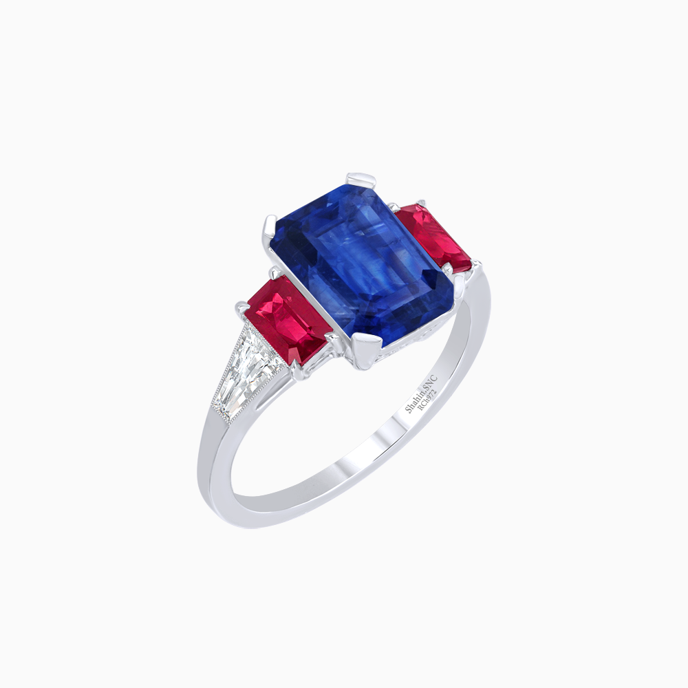 Art Deco Inspired Emerald Cut Three-Stone Ring with Tapered Baguettes
