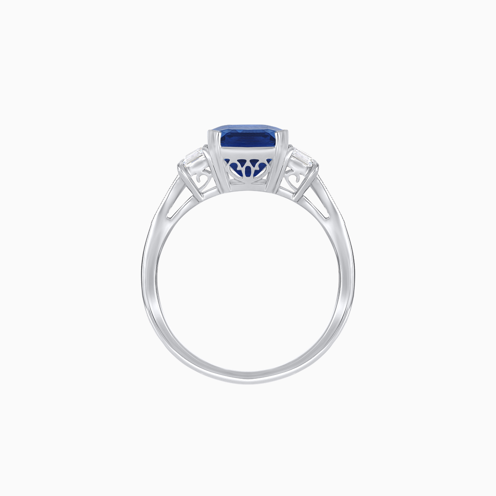Art Deco Inspired Emerald Cut Three-Stone Ring with Tapered Baguettes