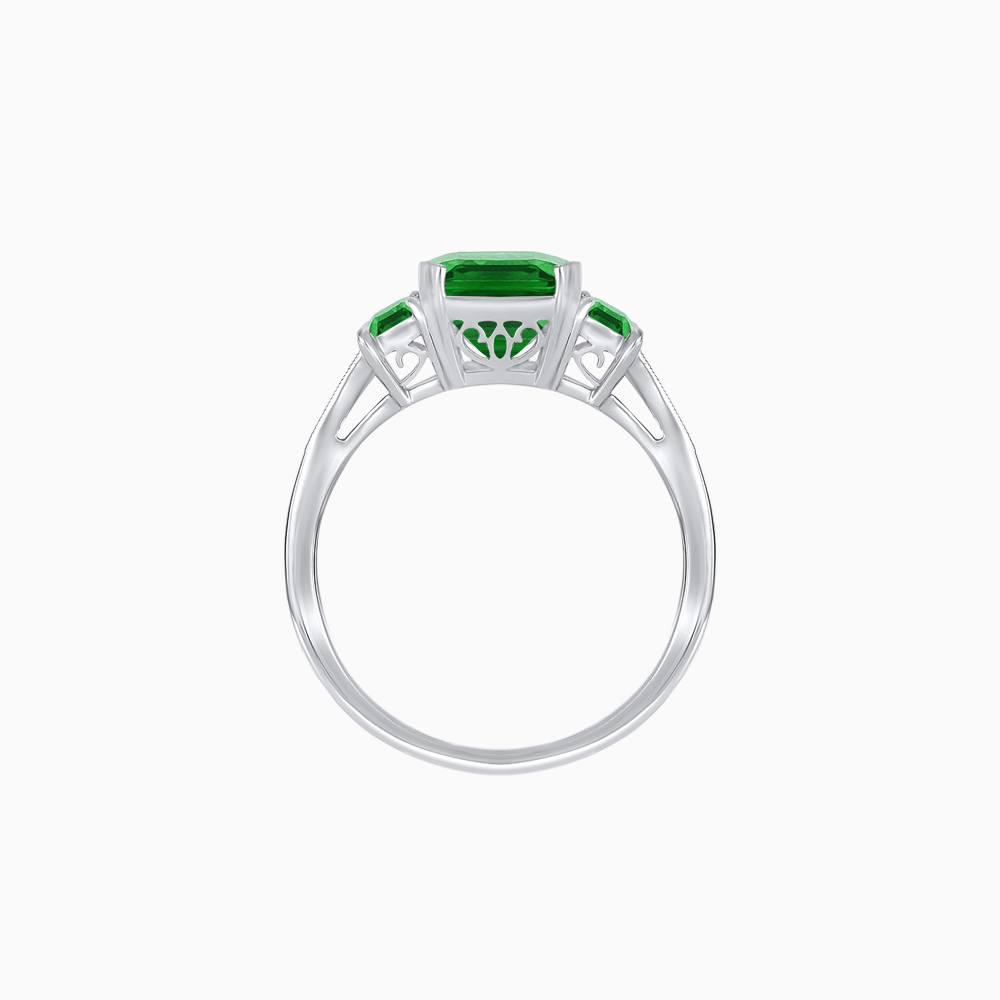 Art Deco Inspired Emerald Cut Three-Stone Ring with Tapered Baguettes