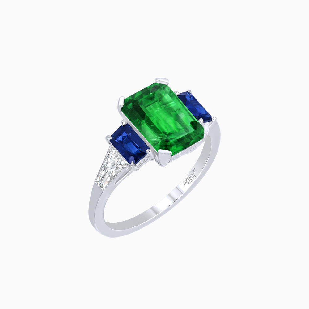 Art Deco Inspired Emerald Cut Three-Stone Ring with Tapered Baguettes