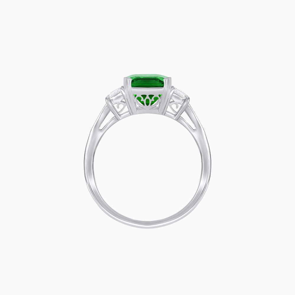 Art Deco Inspired Emerald Cut Three-Stone Ring with Tapered Baguettes