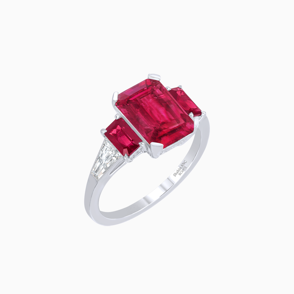 Art Deco Inspired Emerald Cut Three-Stone Ring with Tapered Baguettes