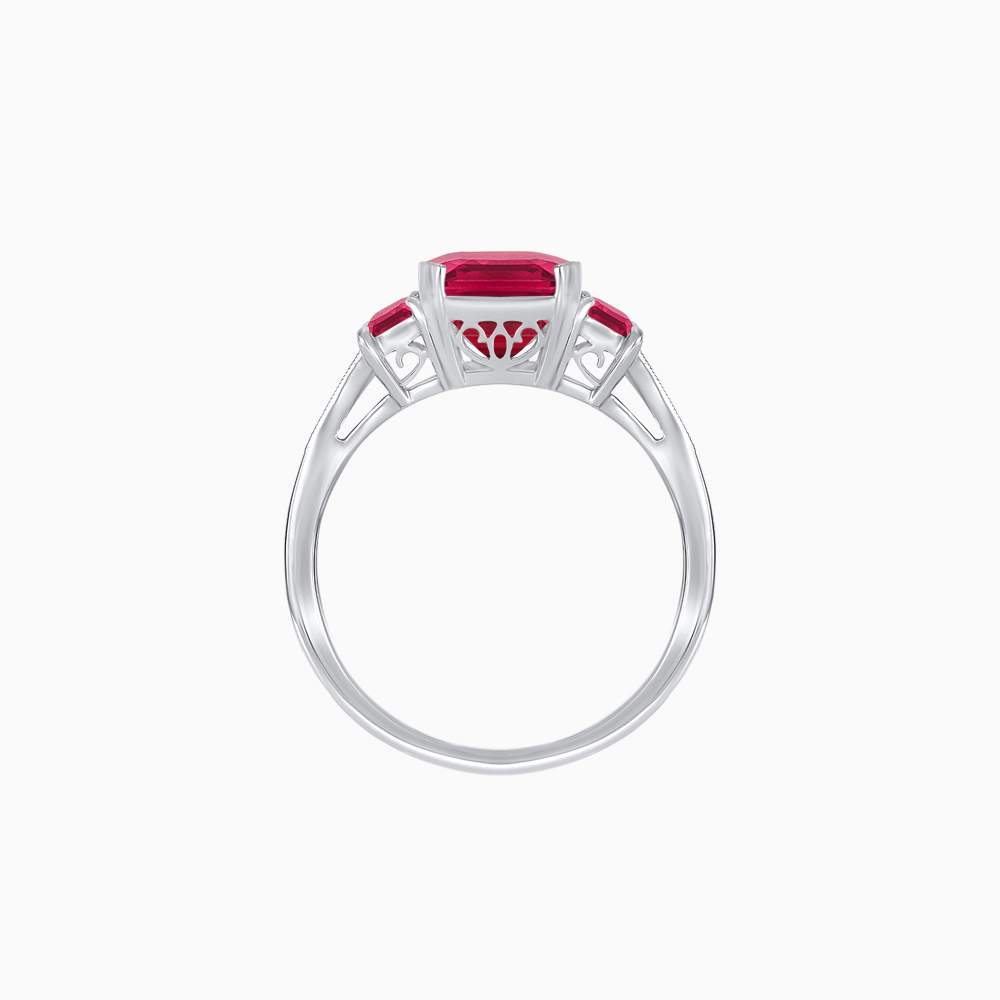 Art Deco Inspired Emerald Cut Three-Stone Ring with Tapered Baguettes
