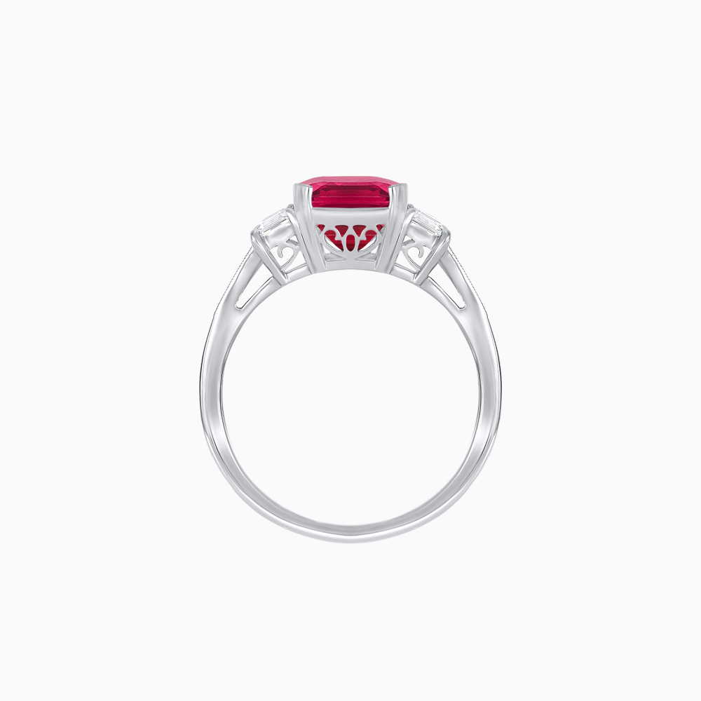 Art Deco Inspired Emerald Cut Three-Stone Ring with Tapered Baguettes