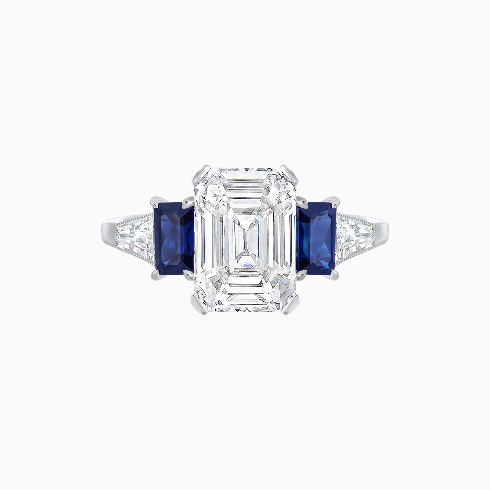 Art Deco Inspired Emerald Cut Three-Stone Ring with Tapered Baguettes