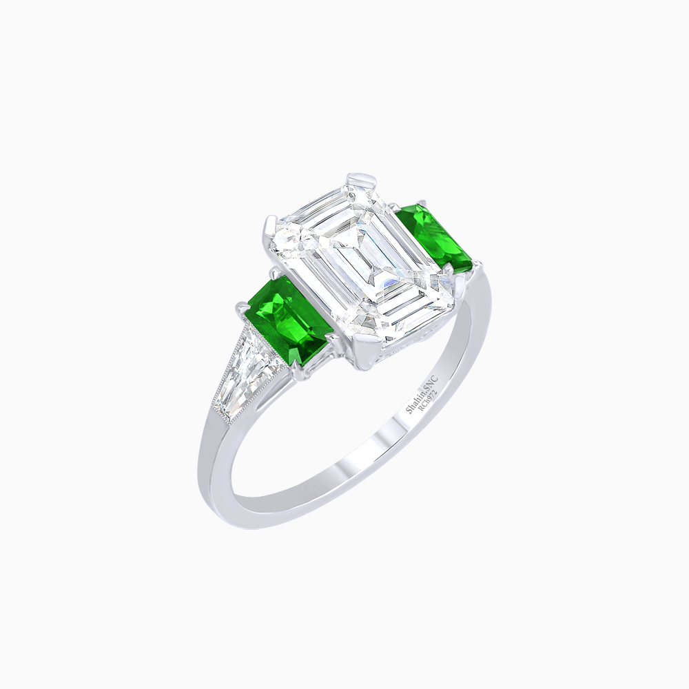 Art Deco Inspired Emerald Cut Three-Stone Ring with Tapered Baguettes