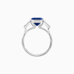 Load image into Gallery viewer, Modern Art Deco Inspired Emerald-Cut Bezel Engagement Ring with Tapered Baguette Side Stones