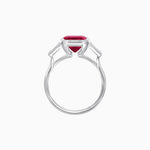 Load image into Gallery viewer, Modern Art Deco Inspired Emerald-Cut Bezel Engagement Ring with Tapered Baguette Side Stones