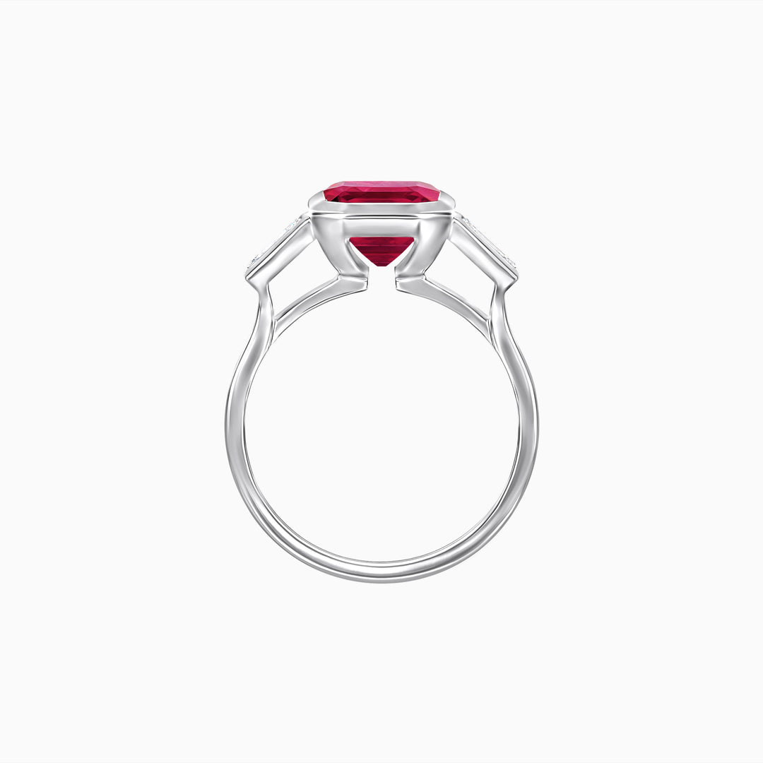 Modern Art Deco Inspired Emerald-Cut Bezel Engagement Ring with Tapered Baguette Side Stones