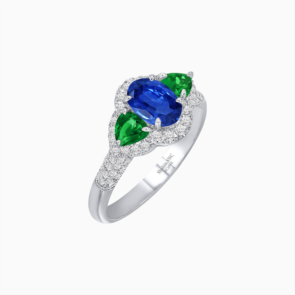 Three-Stone Oval Ring with Pear Shape Side Stones and Diamond Halo