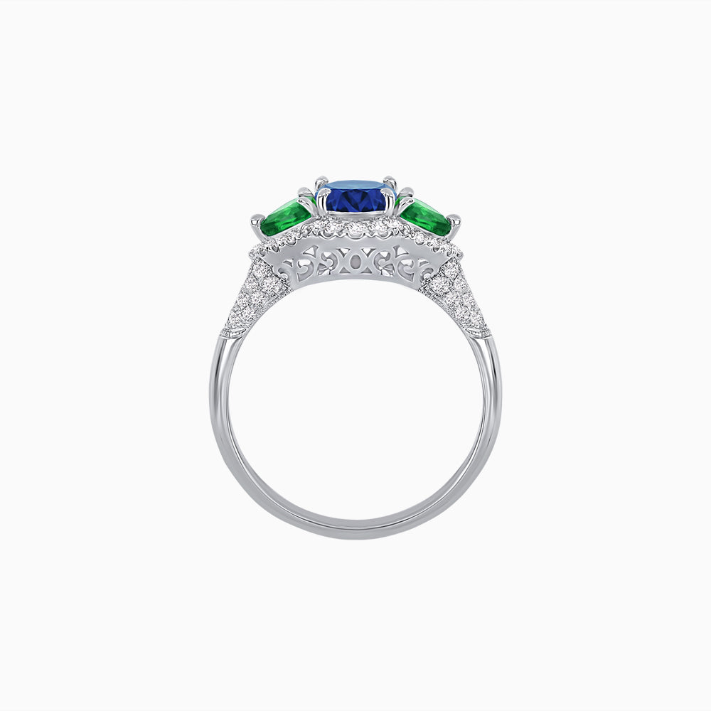Three-Stone Oval Ring with Pear Shape Side Stones and Diamond Halo