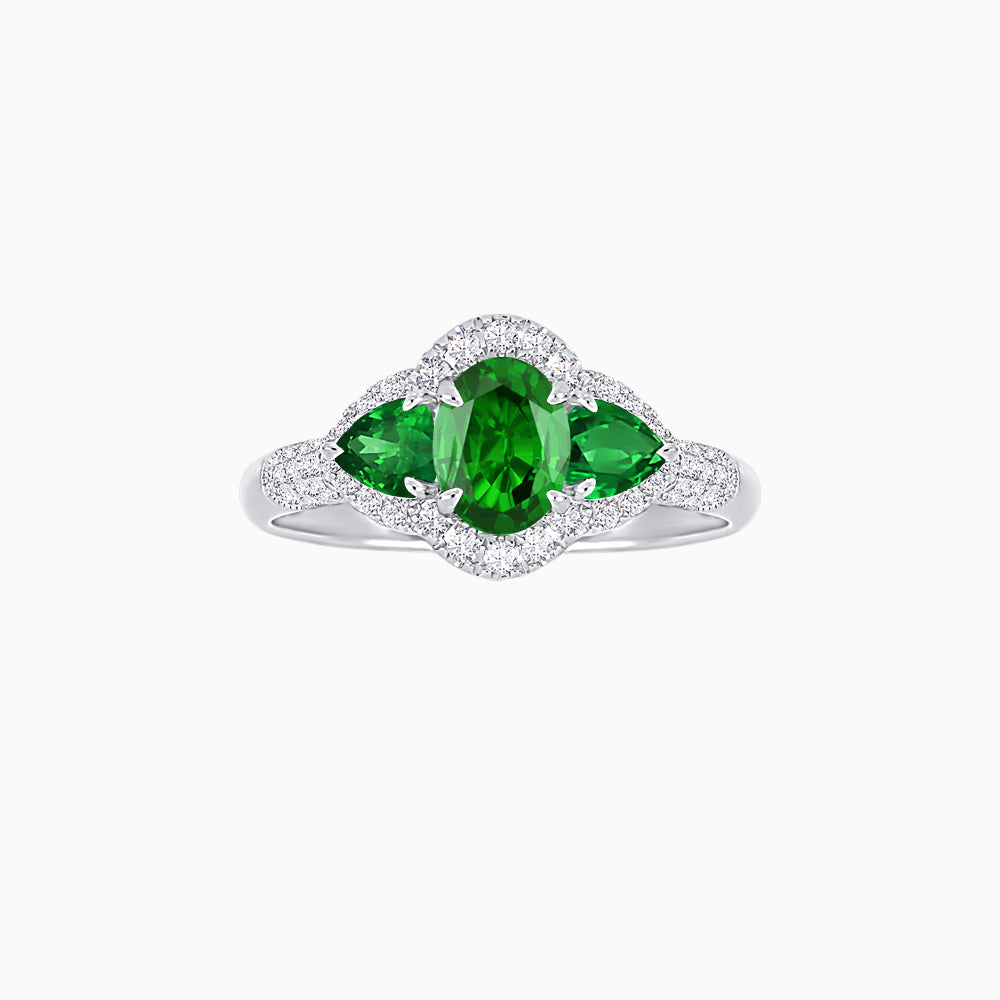 Three-Stone Oval Ring with Pear Shape Side Stones and Diamond Halo