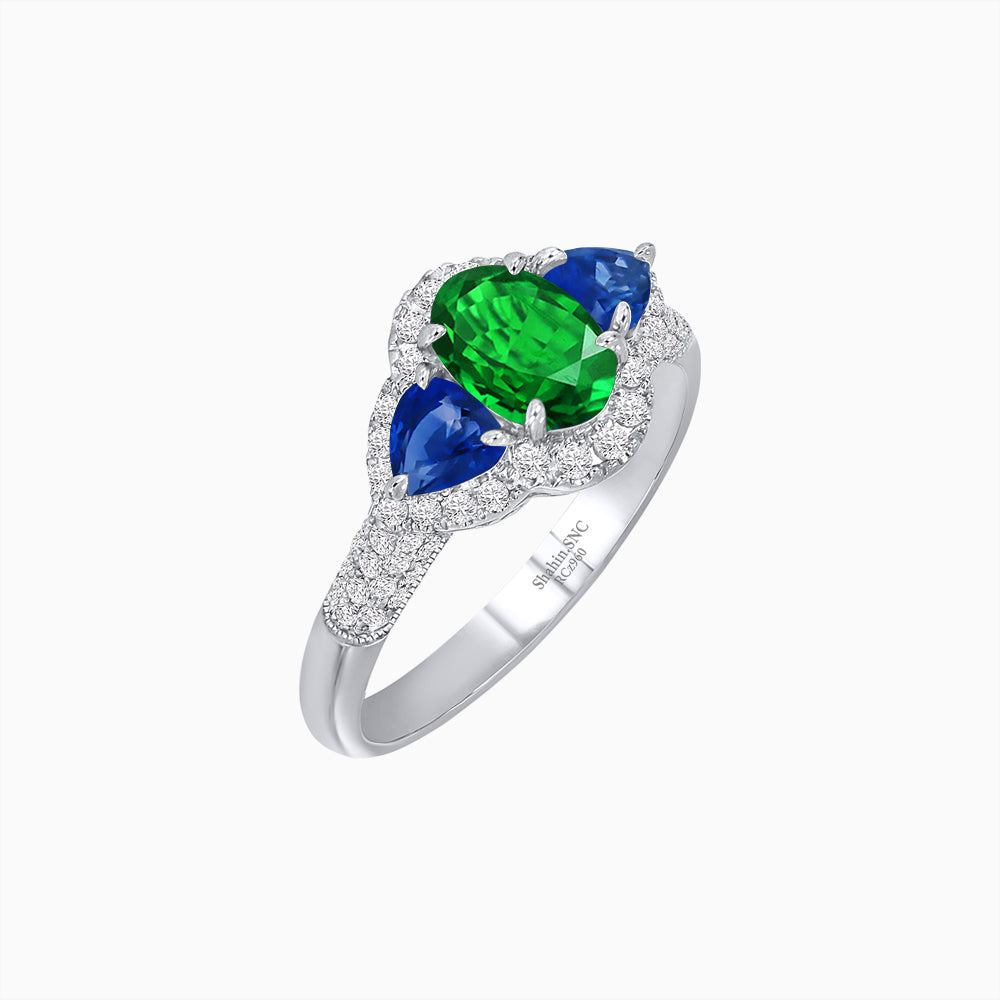 Three-Stone Oval Ring with Pear Shape Side Stones and Diamond Halo