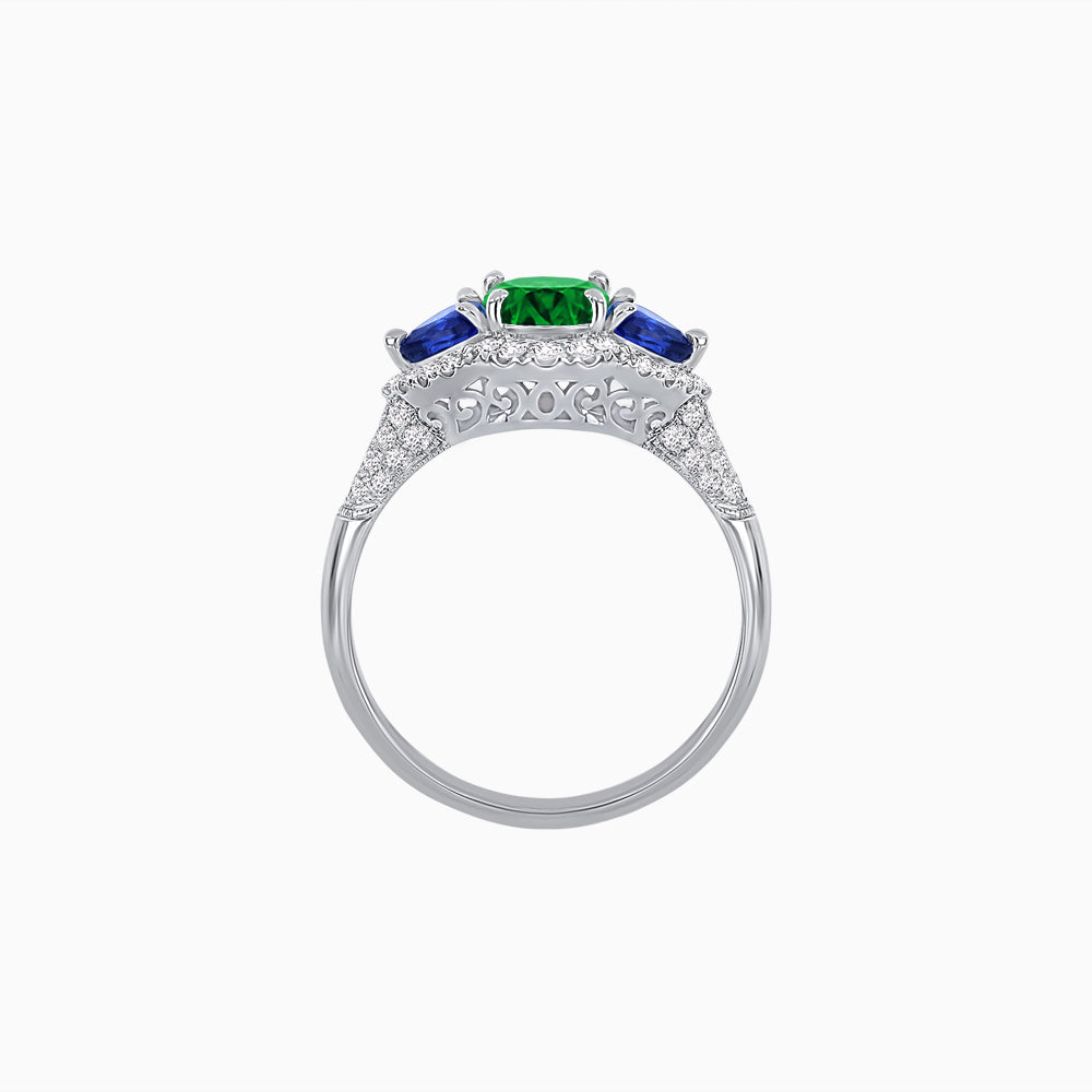 Three-Stone Oval Ring with Pear Shape Side Stones and Diamond Halo
