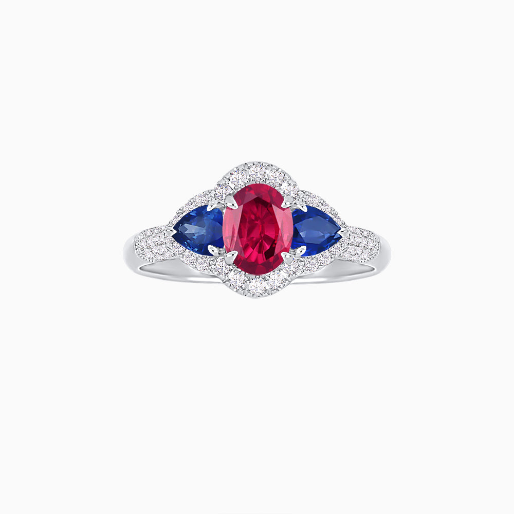 Three-Stone Oval Ring with Pear Shape Side Stones and Diamond Halo