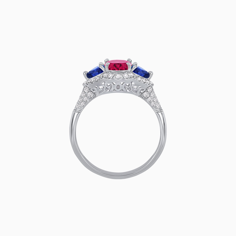 Three-Stone Oval Ring with Pear Shape Side Stones and Diamond Halo