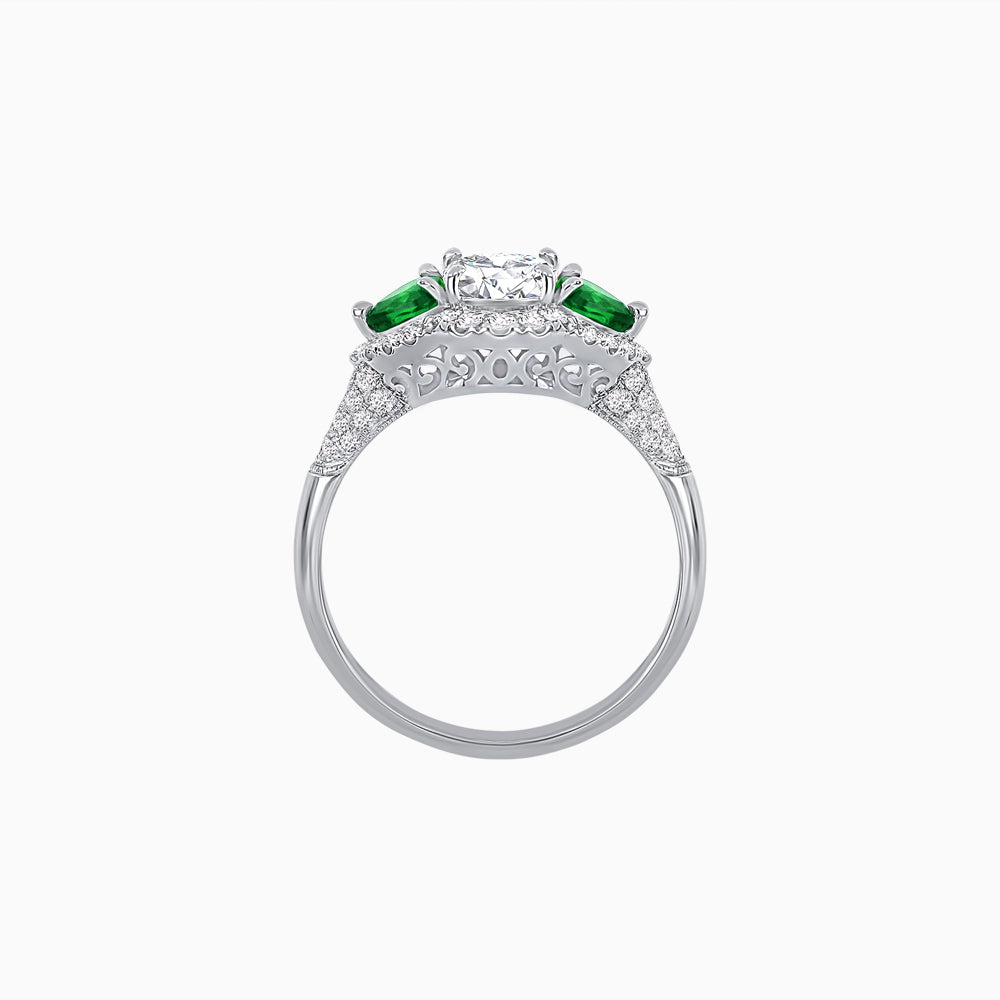 Three-Stone Oval Ring with Pear Shape Side Stones and Diamond Halo