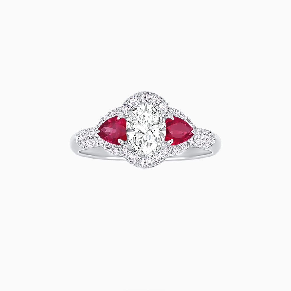 Three-Stone Oval Ring with Pear Shape Side Stones and Diamond Halo