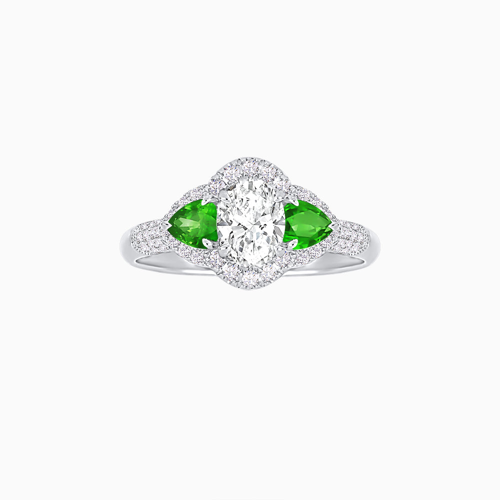 Three-Stone Oval Ring with Pear Shape Side Stones and Diamond Halo