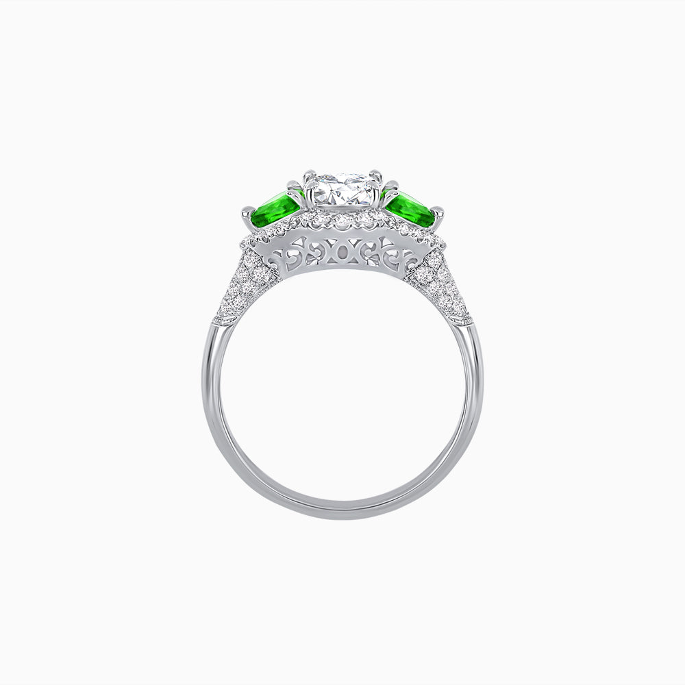 Three-Stone Oval Ring with Pear Shape Side Stones and Diamond Halo