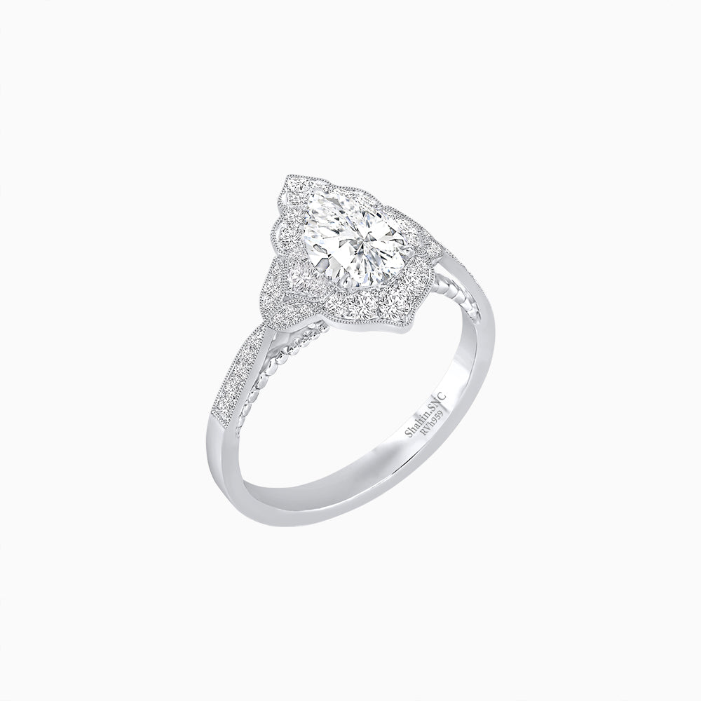 Vintage Inspired Pear Cut Floral Halo Ring with Milgrain