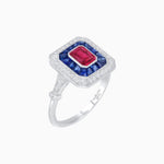 Load image into Gallery viewer, Art Deco Inspired Emerald Cut Halo Ring with Calibré Gems - Shahin Jewelry