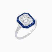 Art Deco Inspired Octagonal Halo Ring with Oval Center Stone and French-Cut Gemstone Border - Shahin Jewelry